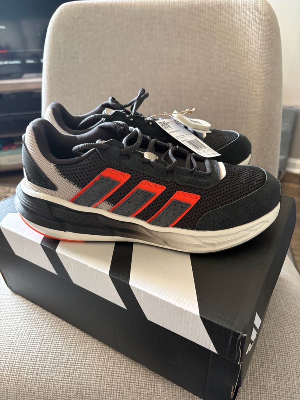 Adidas Astrastar Black Sneakers with Orange Stripe Accents - Picture 2 of 8